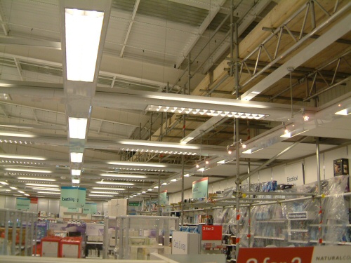 Scaffolding inside Boots Chemist at Reebok, Bolton to allow adding of fire protection to steelwork frame