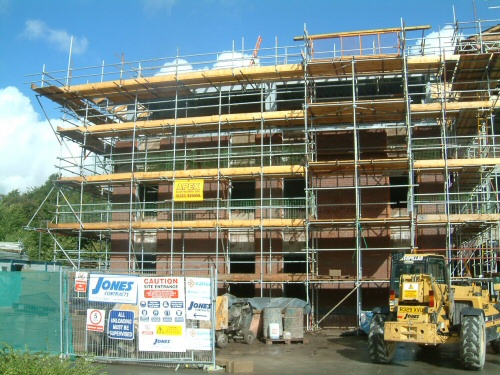 Scaffolding for new build of a large brick office block near Manchester